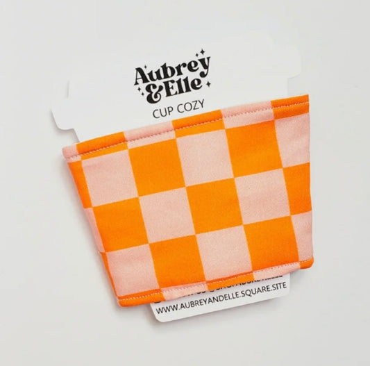 Aubrey + Elle - Pink/Orange Checkered Coffee Cozy